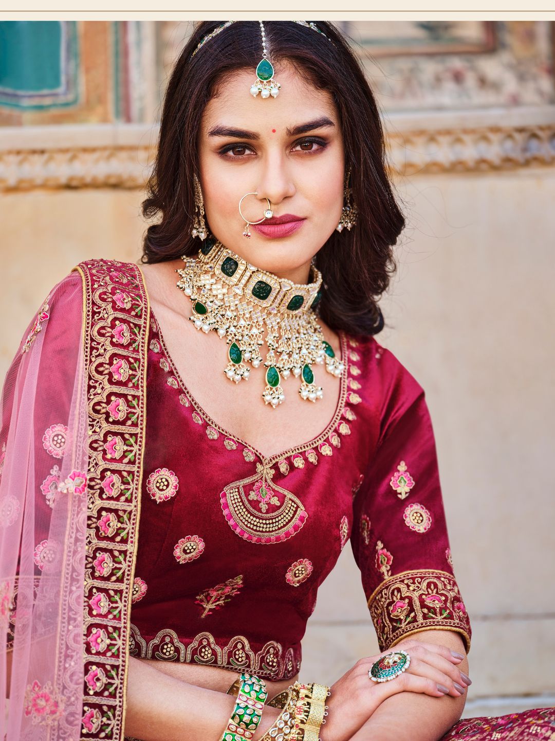 Stone Velvet Bridal Wedding Lehenga in Red and Pink