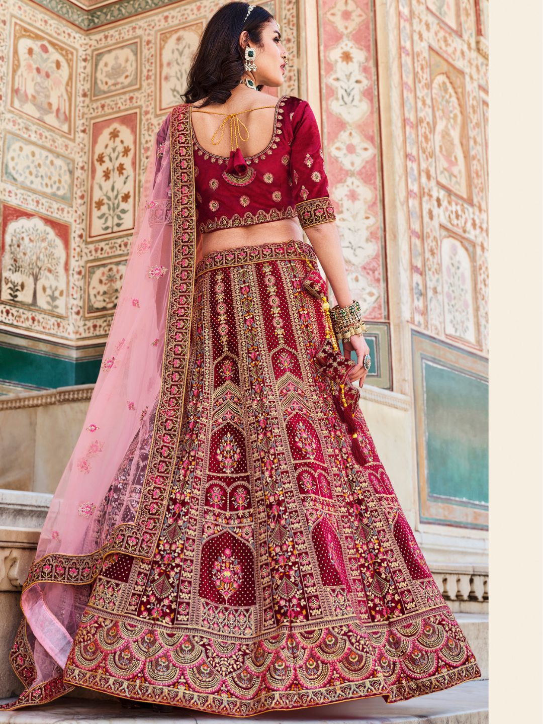 Stone Velvet Bridal Wedding Lehenga in Red and Pink