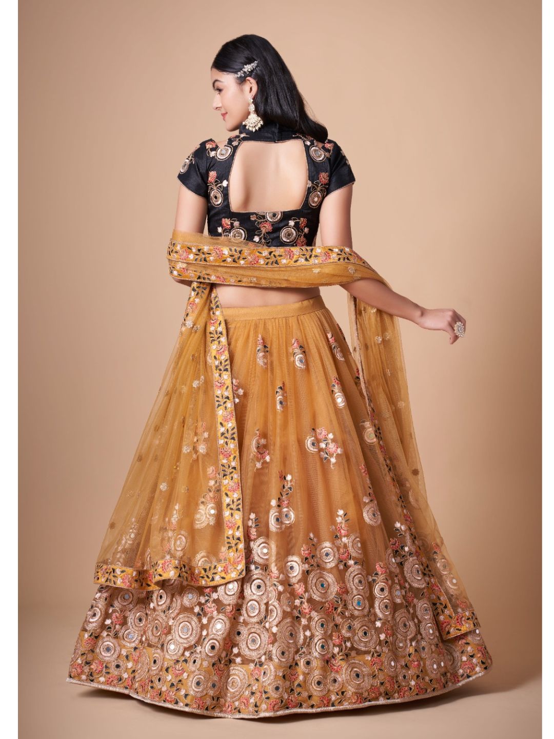 Sequence Net Bollywood A Line Lehenga in Gold