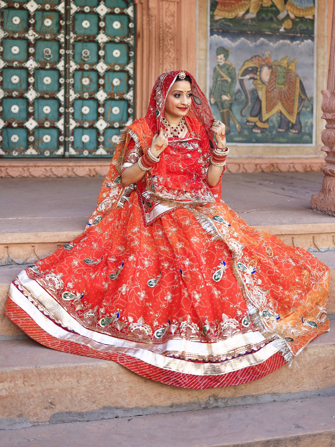 Bandhani Royal Pure 4 mtr full Gher Rajputi Poshak In Orange Color-91308
