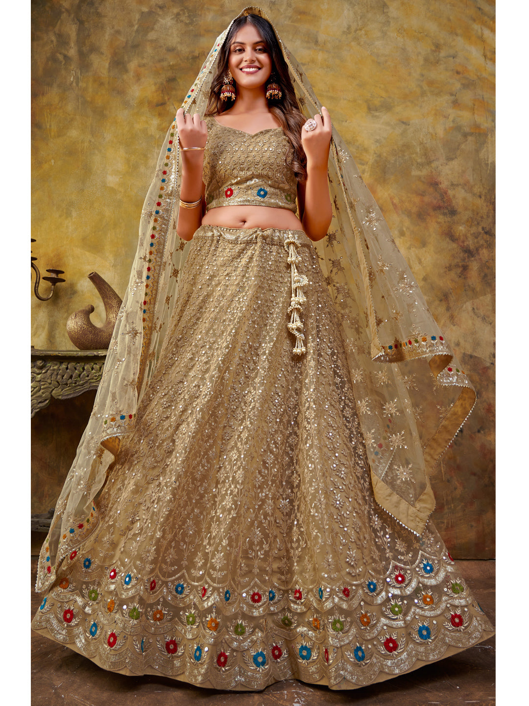 Embroidered Net Partywear Lehenga in Golden