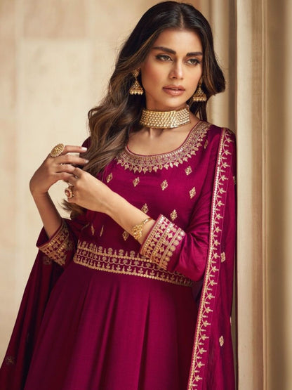 Embroidered Silk Anarkali Style Suit in Magenta