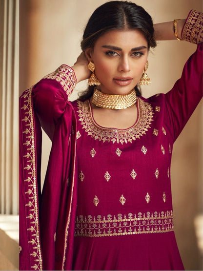 Embroidered Silk Anarkali Style Suit in Magenta