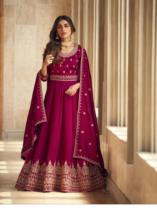 Embroidered Silk Anarkali Style Suit in Magenta