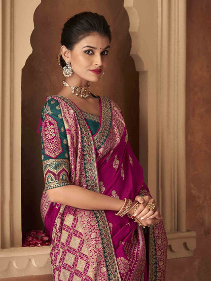 Embroidered Pure Dola Traditional Saree In Magenta