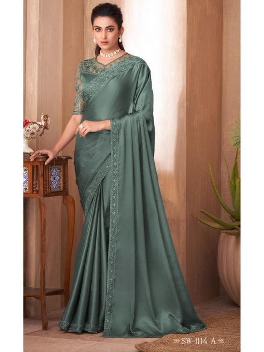 Embroidered Silk Fastive Saree In Green