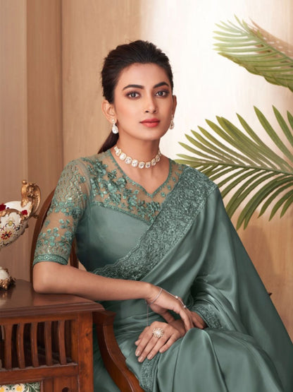 Embroidered Silk Fastive Saree In Green